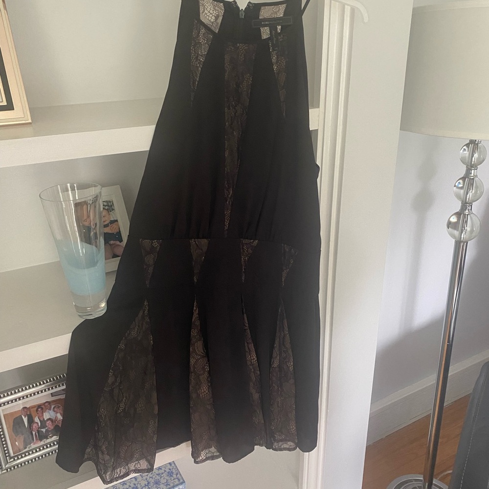 BCBGMaxAzria Black Lace Detail Dress
Nude lining. Gorgeous on!
